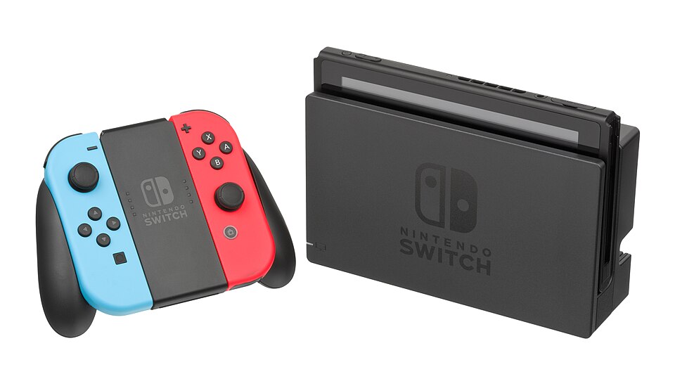 Nintendo Switch with its Joy-Con grip and dock, illustrating the hybrid home-console setup.