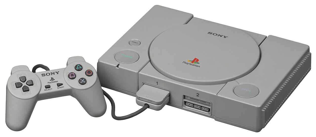 Original Sony PlayStation console with controller.